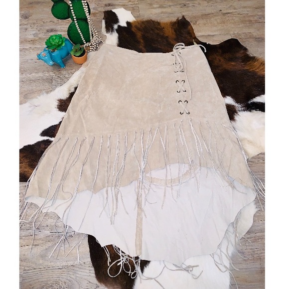 Wet Seal Dresses & Skirts - “Wetseal” suede fringe uneven hem skirt